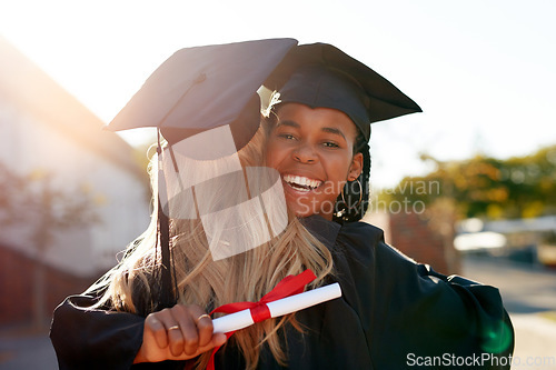 Image of Hug, students and graduation for college or university friends together for congratulations. Portrait of black woman outdoor to celebrate education achievement, success or certificate at school event