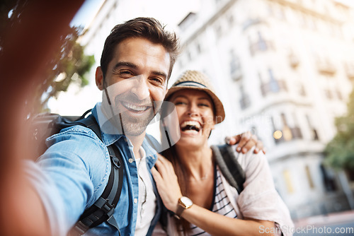 Image of Tourist, selfie and happy couple for travel on city street for holiday memory and happiness. Face of man and woman outdoor for outdoor adventure, journey or vacation for freedom or funny portrait