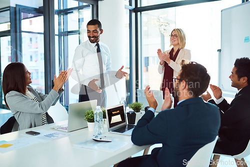 Image of Professionals, applause and presentation for teaching and meeting for the company and employee. Business, people and leadership are clapping during training for success in a workshop at the office.