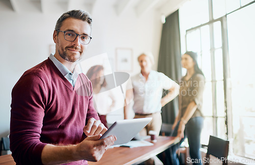 Image of Portrait, man on tablet and web design meeting with team in creative office workspace and planning, research and management. Businessman, happy teamwork and leader working with technology for project