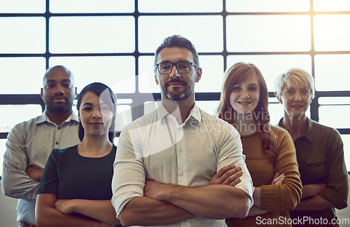 Image of Confidence, leadership and portrait of team with crossed arms in office for unity, collaboration or teamwork. Happy, diversity and business people with success, support and motivation in workplace.