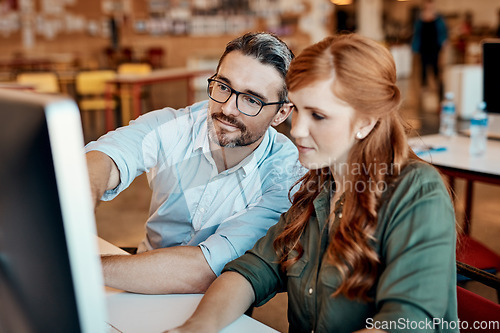 Image of Businessman, computer and coach helping woman for ideas, team strategy or planning at the office. Man mentor coaching employee or training staff on technology for teamwork or solution at workplace