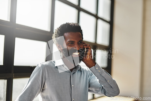 Image of Idea, happy and communication business man at office with a smile or mindset of future success. Thinking, mobile contact and communication with a male employee talking in the office during his break