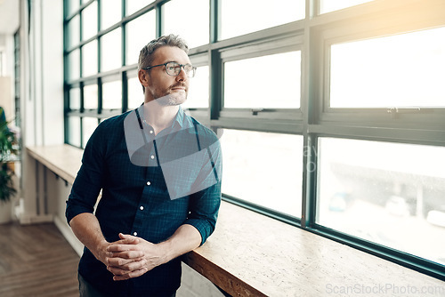 Image of Thinking, ideas and man at office window, creative business project or entrepreneur at design agency. Confident boss with vision and idea at startup, businessman with future plan in workspace