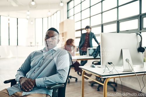 Image of Portrait, pride and black man in chair at office, creative ideas for business project or entrepreneur at design agency. Leader with creativity, idea and African businessman with plan in workspace.