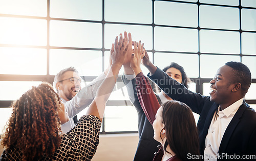 Image of High five, business people and group together for teamwork, collaboration or team building in office. Hands of diversity men and women for corporate support, solidarity and mission or motivation