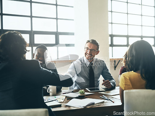 Image of Business man, handshake and deal in a meeting with agreement and contract collaboration. Partnership, success and b2b work with shaking hands to welcome and show congratulations from teamwork