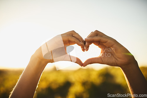 Image of Woman with love hand sign, nature and sunshine, sustainability and eco friendly earth care and natural farm landscape. Conservation, sustainable agro farming and heart hands, emoji and green fingers.