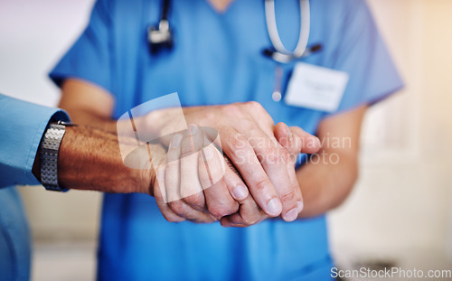 Image of Care, support and a doctor holding hands with a man for healthcare, help and service. Caregiver, love and closeup of a nurse with a helping hand for a senior person for medical trust and nursing