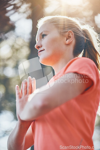 Image of Woman, yoga and meditation with prayer pose, namaste and fitness outdoor with wellness, spiritual and low angle. Female person meditate, zen and exercise with healing, mindfulness and praying