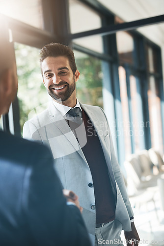 Image of Businessman, handshake and partnership in meeting for b2b agreement, hiring or deal at the office. Happy business people shaking hands in recruiting, teamwork or welcome introduction at the workplace