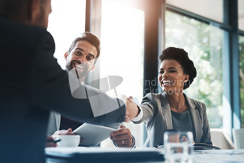 Image of Happy business people, handshake and meeting in teamwork for partnership or collaboration in boardroom. Woman person shaking hands in team recruiting, introduction or b2b agreement at the workplace