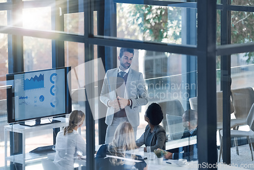 Image of Meeting, presentation and business people with manager on screen statistics, data analytics and charts by window. Speaker or man speaking to employees with infographics, revenue and profit on monitor