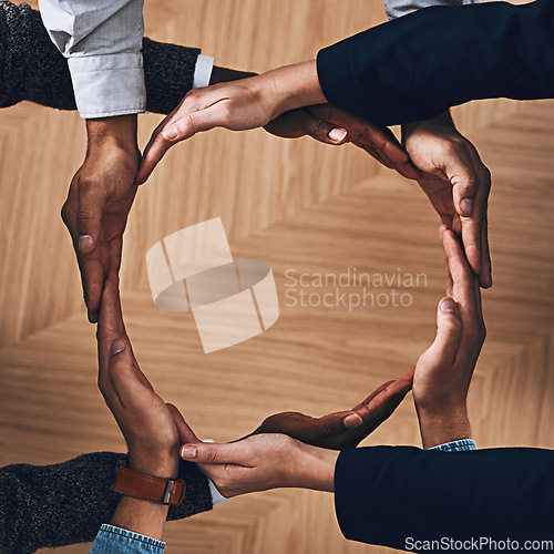 Image of Above, recycle or hands of business people in circle for motivation, support or sustainability in office. Teamwork, recycling or employees for sustainable goals, community help or partnership group