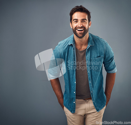 Image of Portrait, mockup and man with a smile, fashion and confident guy against a grey studio background. Face, male person and model with happiness, casual outfit and laugh with clothes, relax and funny