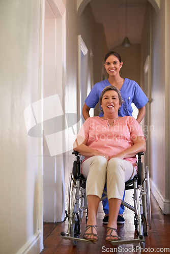 Image of Happy woman, wheelchair and nurse with homecare helping, healthcare service and disability support. Caregiver, disabled patient or senior person, health insurance and home, adn and rehabilitation