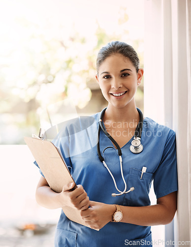 Image of Woman doctor, clipboard and portrait for medical service, hospital documents and nursing registration or information. Face, smile and professional doctor or healthcare person, checklist and clinic