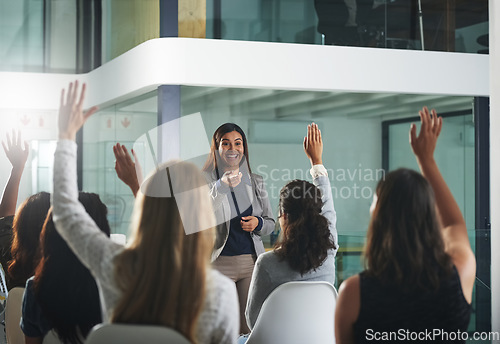 Image of Hands up, black woman or business people in a presentation asking women questions or ideas. Team work, faq or happy female mentor talking, training or speaking to employees in a group discussion