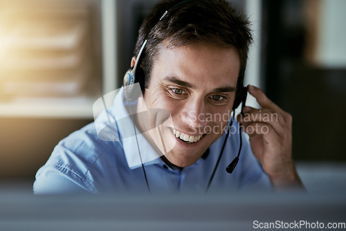 Image of Call center agent, computer and happy man consulting with advice, sales or help desk worker with headset. Phone, conversation and happiness, customer support consultant at crm agency with smile.