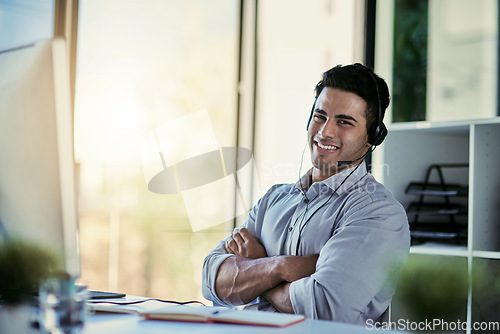 Image of Help desk agent, smile and portrait of man with advice, confidence and happiness at at customer service agency. Happy phone call, conversation and callcenter consultant with headset in modern office.