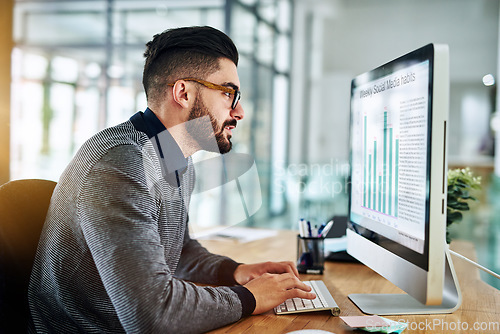 Image of Business man, computer and chart on desktop using data analytics for SEO research at office desk. Male entrepreneur person typing on pc for information technology, infographics and graph statistics