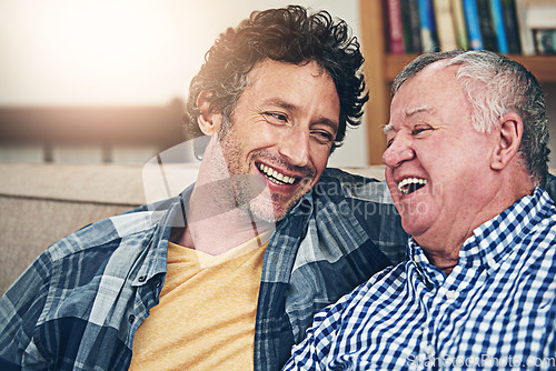 Image of Happy, relax and senior father with son on sofa for bonding, smile and conversation. Retirement, happiness and generations advice with family in living room at home for weekend, love and discussion