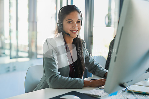 Image of Call center, computer and smile with portrait of woman in office for customer support, advisory and online. Technology, internet and receptionist with employee for contact us, communication and crm