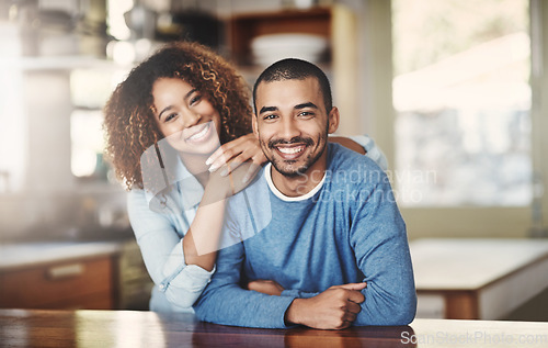 Image of Love, marriage and portrait of happy couple in kitchen of home with smile, embrace and healthy relationship. Happiness, man and woman with pride, affection and romance, young people in new apartment.