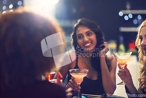 Image of Relax, group and friends with cocktails, nightclub and happiness at a party, event and celebration. Female people, women and girls with drinks, mocktails and alcohol with fun and social gathering