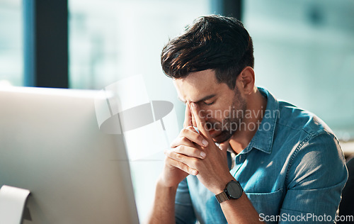 Image of Headache, stress and tired business man at computer in office for anxiety, crisis or technology problem. Burnout, fatigue and frustrated worker at desktop pc with mistake, online glitch or depression