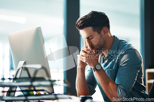 Image of Man, headache and stress at computer in office for problem, burnout and crisis of anxiety, brain fog and pain. Tired, frustrated and sad worker at desktop for mistake, online glitch and bankruptcy