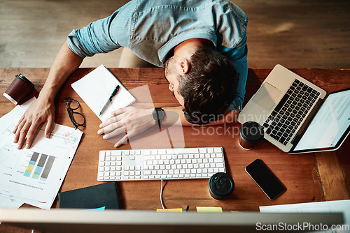 Image of Top view, tired man and sleeping at desk in office with burnout, bored and stress. Fatigue, lazy and overworked business employee taking nap at table for frustrated deadline, depression or low energy