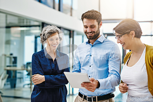 Image of Happy business people, tablet and meeting in team collaboration, planning or coaching at the office. Group of employee workers working on technology with smile for teamwork, research or networking