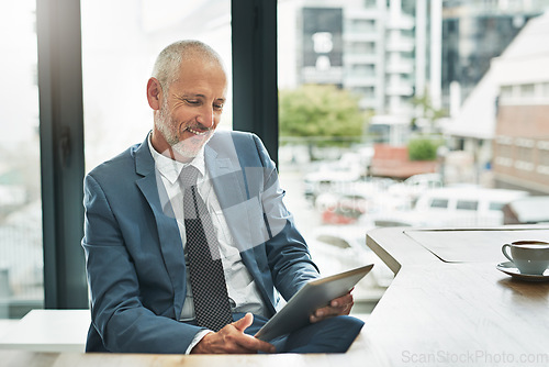 Image of Tablet, smile and business man in office for networking, research and digital. Social media, internet and email with senior male employee browsing online for corporate, professional and communication