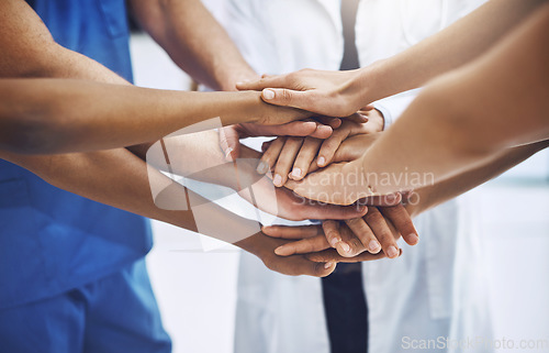 Image of Teamwork, medical and support with hands of doctors for community, collaboration and solidarity. Medicine, healthcare and expert with closeup of people in meeting for target, goals and faith