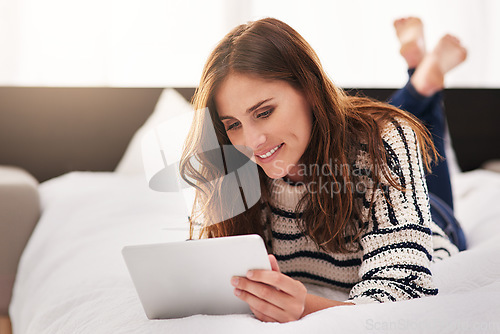 Image of Search, happy and tablet with woman on bed for social media, communication and digital. Internet, technology and website with female person reading online at home for ebook, streaming and happiness