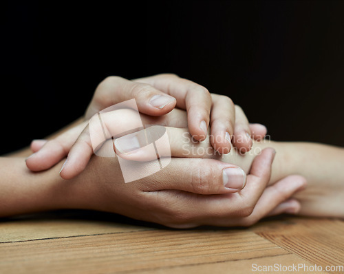 Image of Closeup, empathy and holding hands for support, healing and care with compassion, loving and bonding. Zoom, people and friends with grief, hope and crisis with trust, love and sympathy with peace