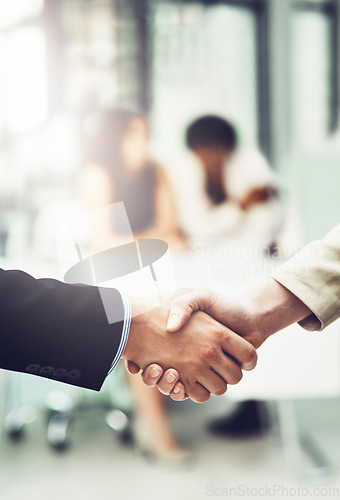Image of Collaboration, greeting and business people shaking hands in office after a meeting or interview. Partnership, team and closeup of corporate employees with handshake for deal or welcome in workplace.