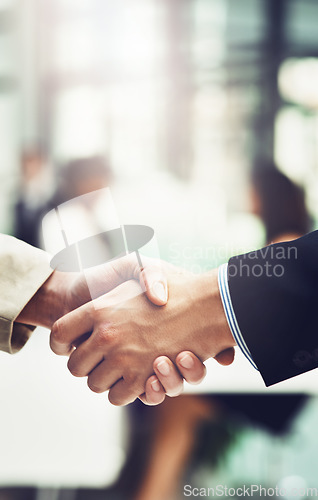 Image of Partnership, welcome and team shaking hands in office after corporate meeting or interview. Collaboration, deal and closeup of business people with handshake for greeting or introduction in workplace