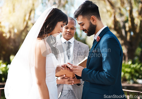 Image of Love, wedding and couple with a ring, marriage and bonding with relationship, commitment and milestone. Partners, bride and groom with jewellery, married and celebration with happiness and romance