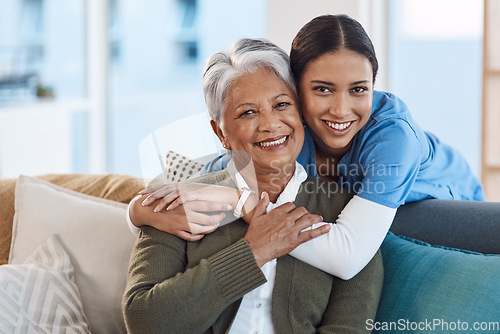 Image of Smile, portrait and nurse hugging old woman in retirement house, bonding and medical care. Face, hug and elderly person with caregiver in nursing home on living room sofa for health, support or help.