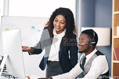 Image of Call center, black people training and with computer at desk in a office with the team coach. Telemarketing or communication, teamwork or collaboration and corporate colleagues discussing together