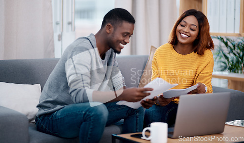Image of Home, smile and black couple with paperwork, laptop and discussion with budget, conversation and planning funding. Partnership, man and woman with technology, talking and documents for investments