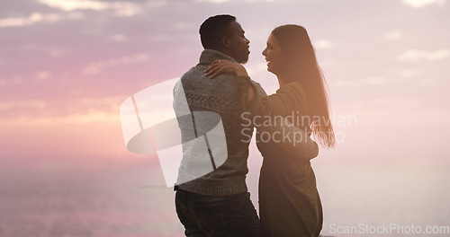 Image of Couple, dancing and sunset sky at the beach while happy on vacation, holiday or adventure. A man and woman dance to celebrate love, marriage and travel journey or date outdoor in nature with mockup