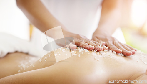 Image of Spa, salt and woman hands massage client for skin care, self love and luxury stress relief for the body to relax. Scrubbing, beauty and person in a dermatology salon to exfoliate for wellness