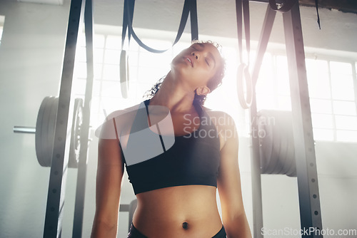 Image of Stretching, tired and sports with woman in gym for cardio, training and performance. Sweating, exhausted and workout with female athlete in fitness center for exercise, competition and strong