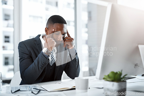 Image of Corporate black man, headache and stress in workplace with burnout, depression and pain in office. Male professional at desk, migraine and tired person, overworked with anxiety and business crisis
