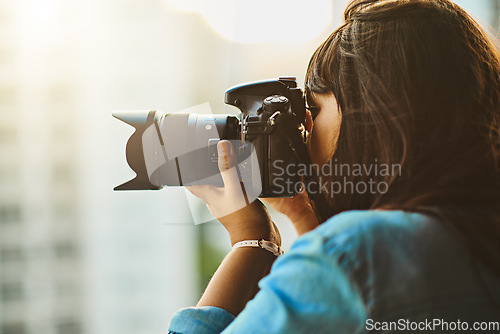 Image of Travel, photographer or woman with a camera, city or capture memory on a vacation. Female person, professional or girl with photography equipment, outside or shooting on holiday, pictures and journey