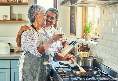 Image of Toast, wine and senior couple at stove cooking healthy food together in kitchen with smile, health and romance. Cheers, drinks and old woman with man, glass and happiness, meal in pan and retirement.
