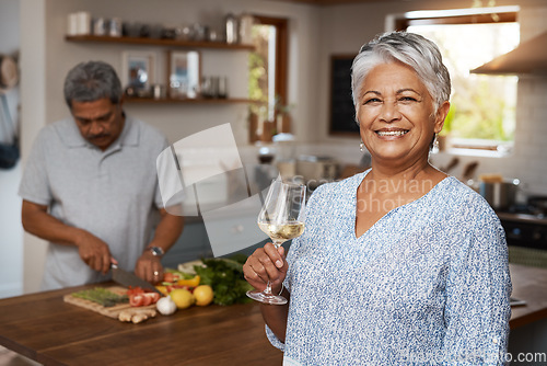 Image of Portrait of senior woman with wine, man and cooking healthy food in kitchen together in home. Drink, smile and old couple in house with meal prep, happiness and wellness diet for lunch in retirement.